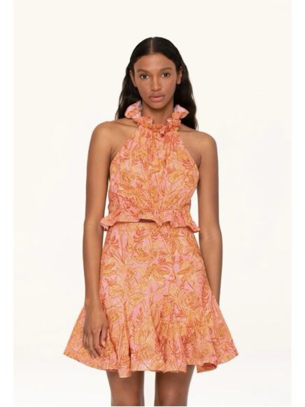 Gently worn AGUA BY AGUA BENDITA
Nardo Floral Cotton Halter Crop Top and matchi